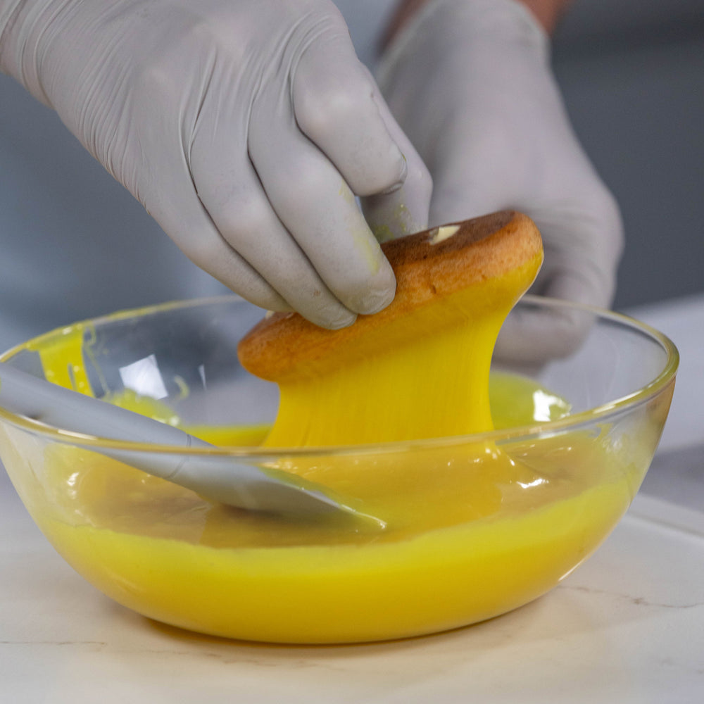 Dipping and Glazing Yellow Eclair with Lemon. Best Haute Food Colors by Ksenia Penkina, Natural Colouring, Water Soluble, Oil Soluble, Fat Soluble Powder, Professional, Chefrubber, Colourmill, Chefmaster, Silikomart, Pavoni, Decorelief, Matfer, PastryClass, Valrhona, Cacao Barry, For Macarons, For Cakes
